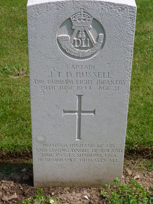 Captain J T D Russell's CWGC headstone.
