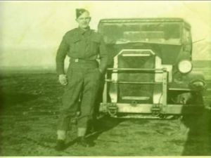 Private William Cooper alongside 15cwt truck in Iceland